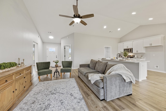 3202 Liz Ct, Crestview, FL 32539 - living area with light wood-type flooring, baseboards, a ceiling fan, high vaulted ceiling, and recessed lighting