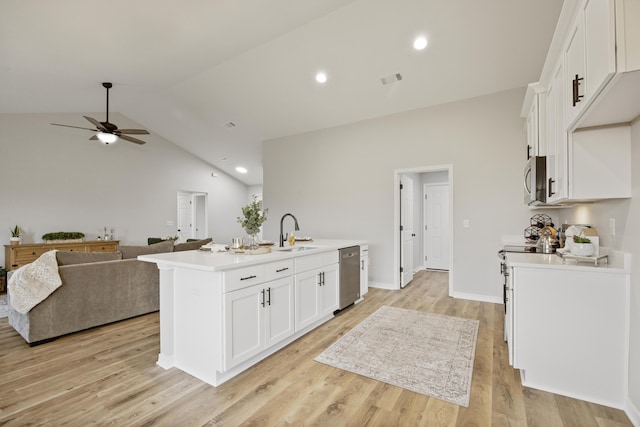 3202 Liz Ct, Crestview, FL 32539 - kitchen featuring a sink, stainless steel appliances, lofted ceiling, white cabinets, and ceiling fan