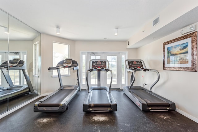 workout area with baseboards and visible vents
