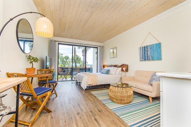 bedroom with access to outside, crown molding, wood finished floors, and wooden ceiling