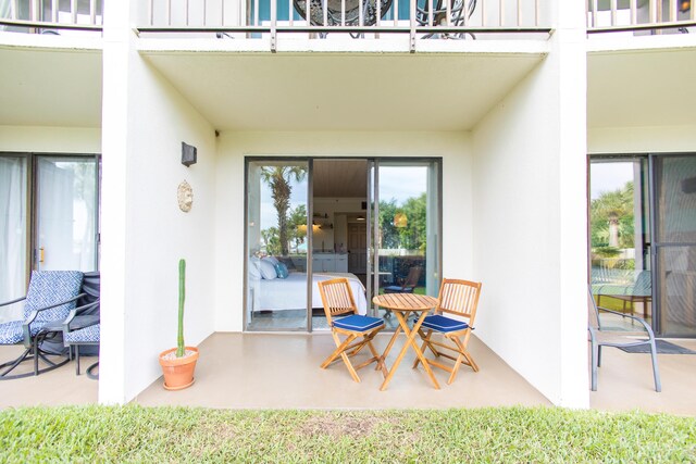 view of patio / terrace with a balcony