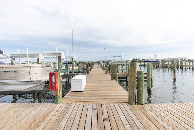 view of dock with a water view and boat lift