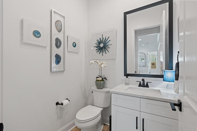 197 Suwannee Dr Lot 18, Watersound, FL 32461 - bathroom with baseboards, toilet, and vanity