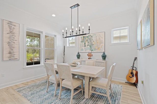 197 Suwannee Dr Lot 18, Watersound, FL 32461 - dining room featuring plenty of natural light, light wood-type flooring, and crown molding
