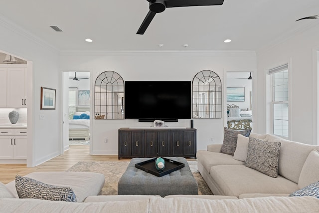 197 Suwannee Dr Lot 18, Watersound, FL 32461 - living room featuring light wood finished floors, visible vents, crown molding, and a ceiling fan