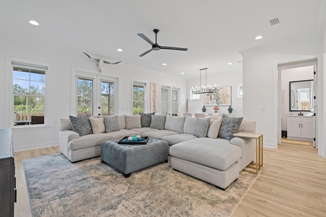 197 Suwannee Dr Lot 18, Watersound, FL 32461 - living area with recessed lighting, ceiling fan with notable chandelier, light wood finished floors, and crown molding