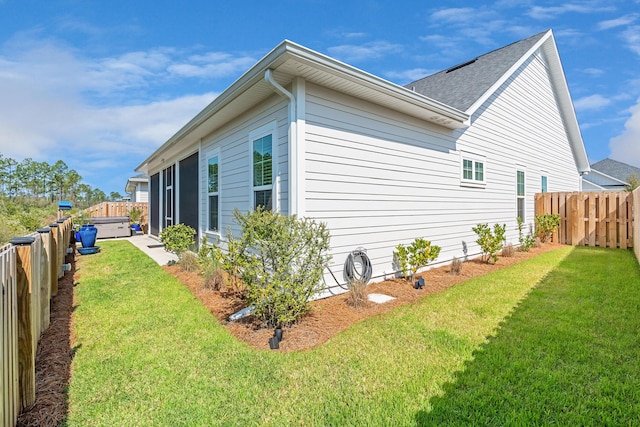 197 Suwannee Dr Lot 18, Watersound, FL 32461 - view of side of home with a fenced backyard and a yard