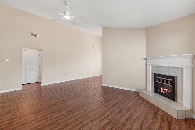309 Wimico Cir, Destin, FL 32541 - unfurnished living room with baseboards, visible vents, wood finished floors, ceiling fan, and a fireplace