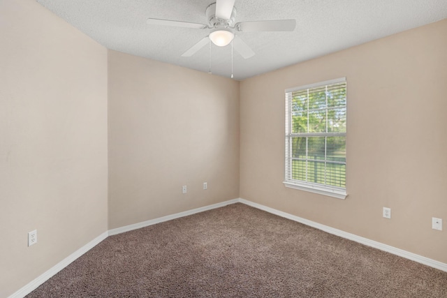 309 Wimico Cir, Destin, FL 32541 - carpeted spare room featuring a textured ceiling, a ceiling fan, and baseboards