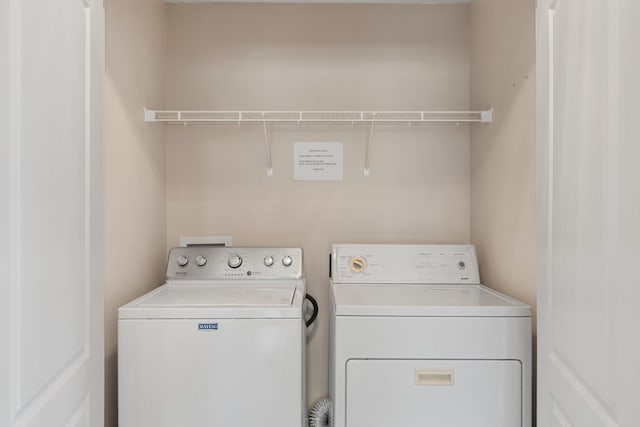 309 Wimico Cir, Destin, FL 32541 - washroom with washing machine and dryer and laundry area