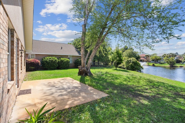 309 Wimico Cir, Destin, FL 32541 - view of yard featuring a patio area and a water view