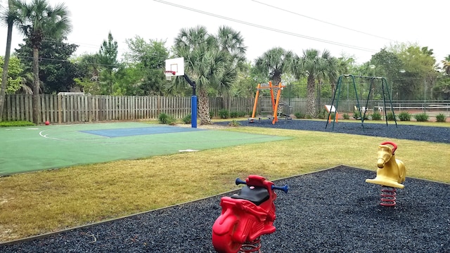 309 Wimico Cir, Destin, FL 32541 - view of basketball court featuring playground community, a lawn, fence, and community basketball court
