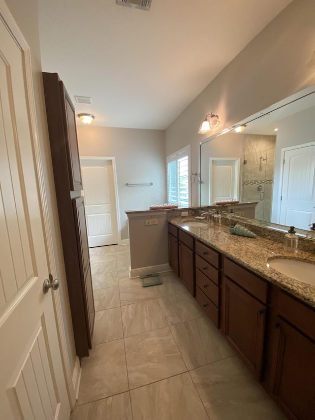 43 Secret St, Freeport, FL 32439 - bathroom featuring a shower stall, double vanity, and marble finish floors