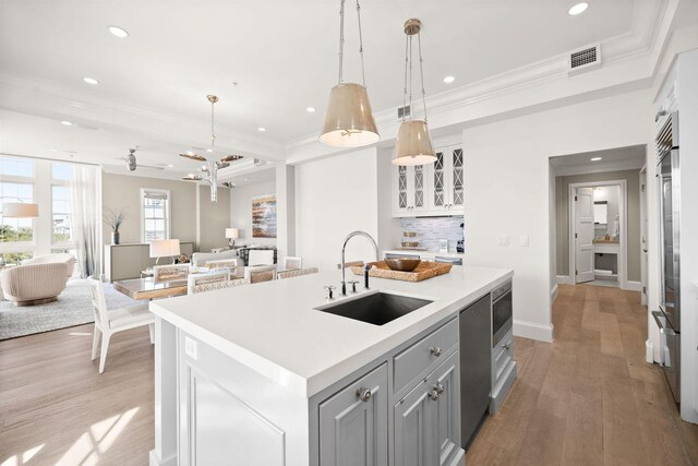 74 Town Hall Rd Unit 3B, Rosemary Beach, FL 32461 - kitchen with visible vents, ornamental molding, and a sink