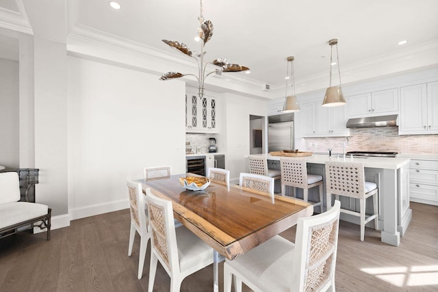 74 Town Hall Rd Unit 3B, Rosemary Beach, FL 32461 - dining room featuring light wood-style flooring, baseboards, ornamental molding, wine cooler, and recessed lighting