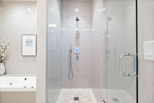 74 Town Hall Rd Unit 3B, Rosemary Beach, FL 32461 - bathroom featuring a jetted tub and a stall shower