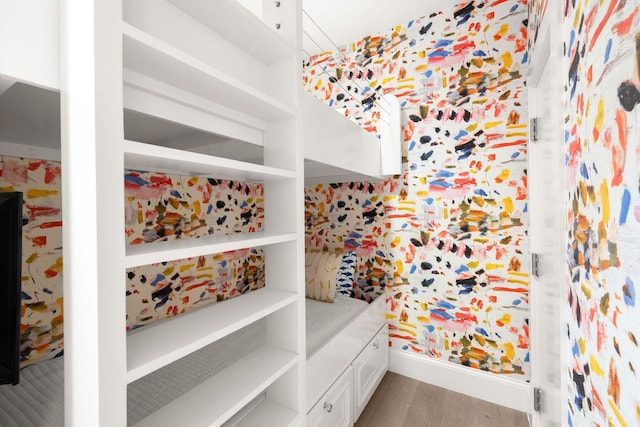 74 Town Hall Rd Unit 3B, Rosemary Beach, FL 32461 - bathroom with baseboards and wood finished floors
