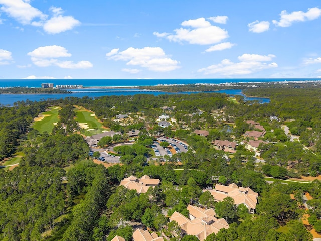 birds eye view of property featuring a water view, view of golf course, and a residential view