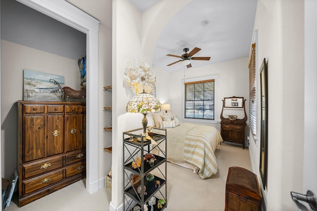 bedroom featuring light colored carpet