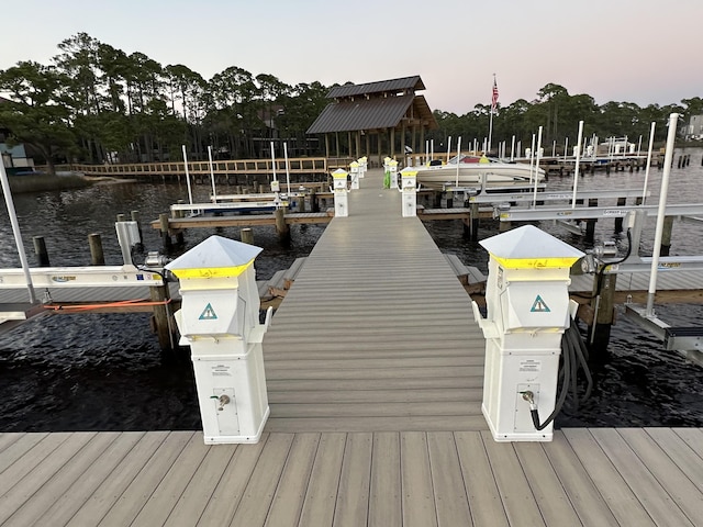 view of dock featuring a water view and boat lift