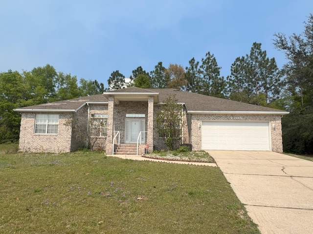 view of front of house with an attached garage, brick siding, a front lawn, driveway, and roof with shingles