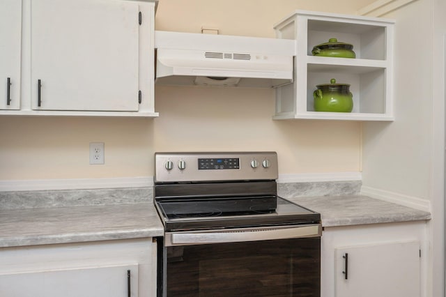 375 N Norwood Rd, Defuniak Springs, FL 32433 - kitchen featuring stainless steel range with electric stovetop, under cabinet range hood, light countertops, white cabinets, and open shelves