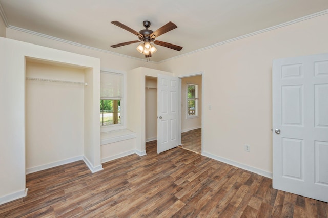 375 N Norwood Rd, Defuniak Springs, FL 32433 - unfurnished bedroom with crown molding, multiple windows, wood finished floors, and baseboards