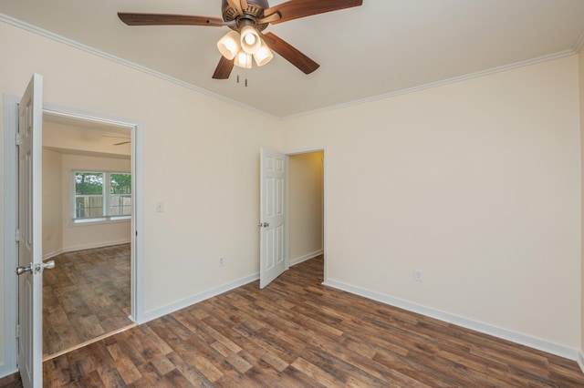 375 N Norwood Rd, Defuniak Springs, FL 32433 - unfurnished bedroom with ornamental molding, dark wood-style floors, baseboards, and ceiling fan