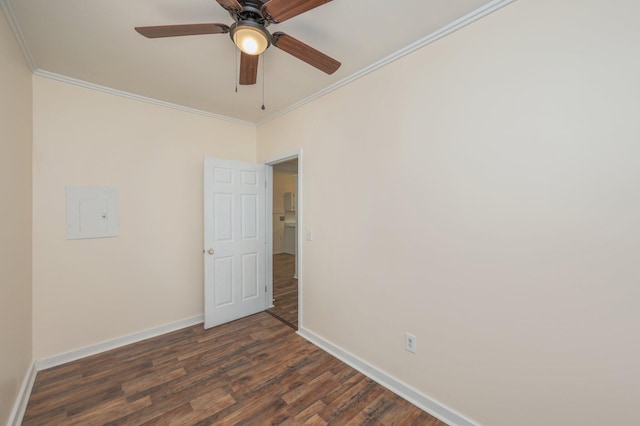 375 N Norwood Rd, Defuniak Springs, FL 32433 - spare room with crown molding, baseboards, dark wood finished floors, ceiling fan, and electric panel