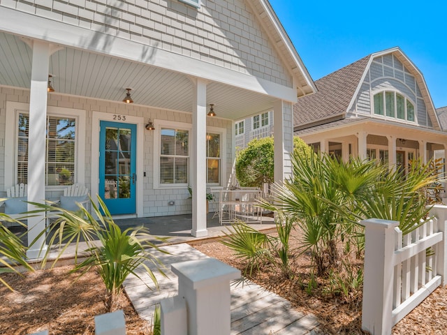 253 Salt Box Ln, Watersound, FL 32461 - property entrance featuring covered porch and fence