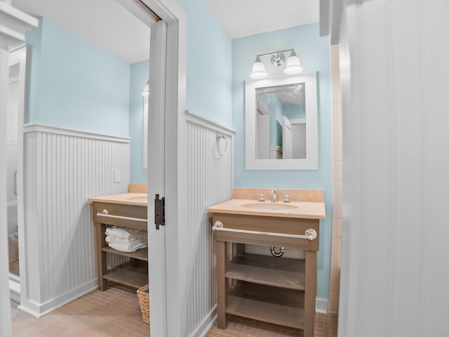 253 Salt Box Ln, Watersound, FL 32461 - bathroom featuring vanity and tile patterned floors