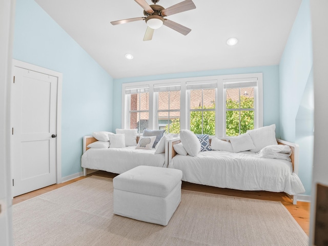 253 Salt Box Ln, Watersound, FL 32461 - bedroom featuring multiple windows, lofted ceiling, wood finished floors, recessed lighting, and a ceiling fan