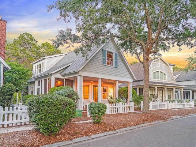 253 Salt Box Ln, Watersound, FL 32461 - view of front facade featuring a porch and roof with shingles