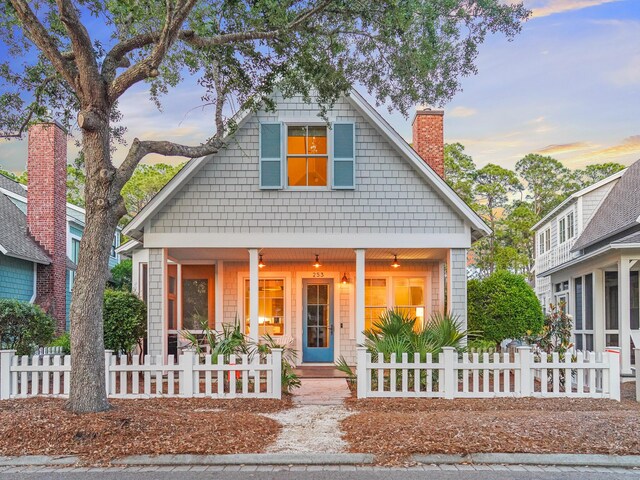 253 Salt Box Ln, Watersound, FL 32461 - bungalow-style home featuring covered porch and a chimney