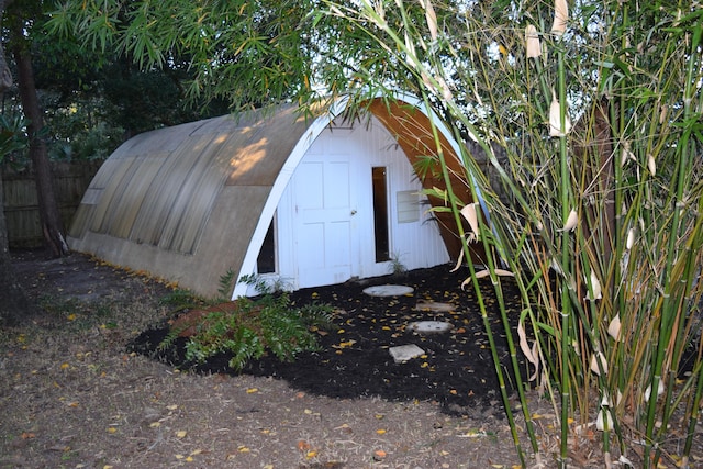 view of outbuilding with an outdoor structure