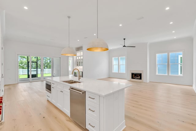 203 E Firethorn Cir Lot 24, Watersound, FL 32461 - kitchen featuring dishwasher, light wood finished floors, plenty of natural light, and recessed lighting