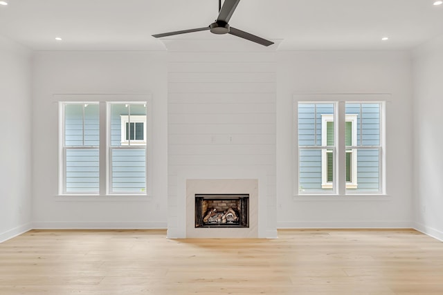 203 E Firethorn Cir Lot 24, Watersound, FL 32461 - unfurnished living room featuring wood finished floors, ceiling fan, plenty of natural light, and recessed lighting