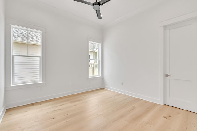 203 E Firethorn Cir Lot 24, Watersound, FL 32461 - empty room with plenty of natural light, light wood-type flooring, and a ceiling fan