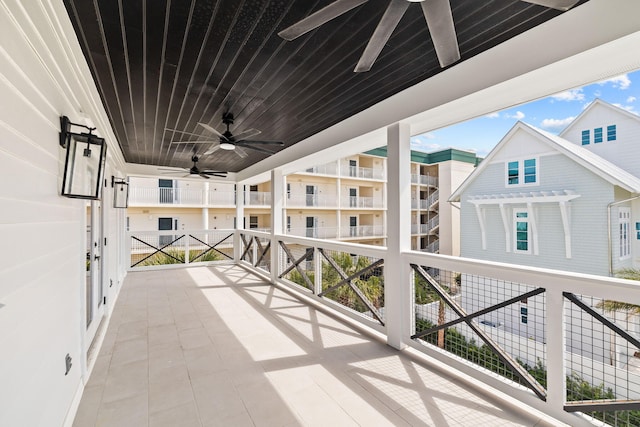 view of patio featuring ceiling fan