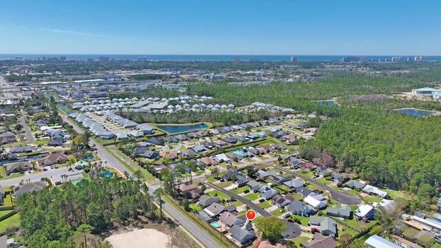 aerial view with a residential view and a water view