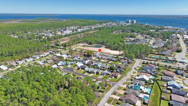 aerial view with a water view and a residential view