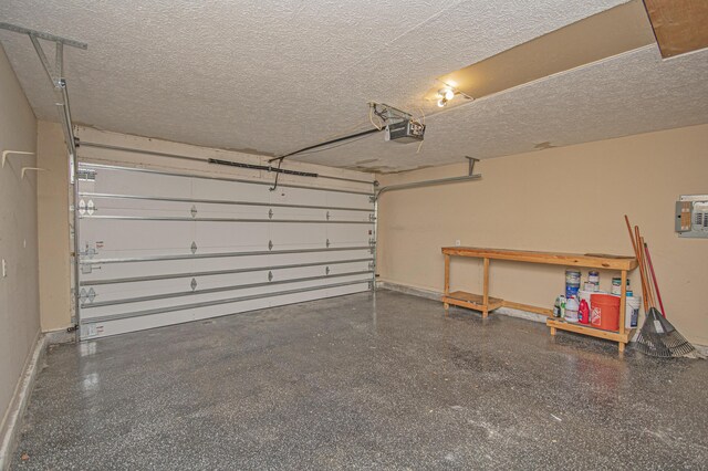 garage featuring baseboards and a garage door opener