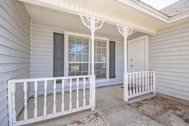 entrance to property with covered porch