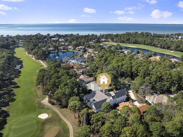 birds eye view of property with a residential view, golf course view, and a water view