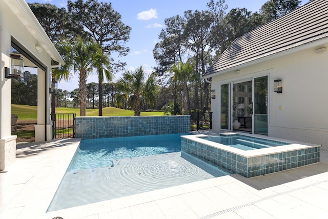 pool with an in ground hot tub