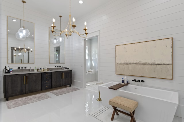 full bath with a soaking tub, tile patterned floors, double vanity, an inviting chandelier, and wooden walls
