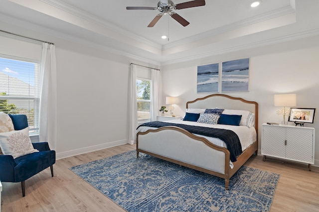 24 Palmer Ln, Santa Rosa Beach, FL 32459 - bedroom featuring a raised ceiling, ornamental molding, and wood finished floors