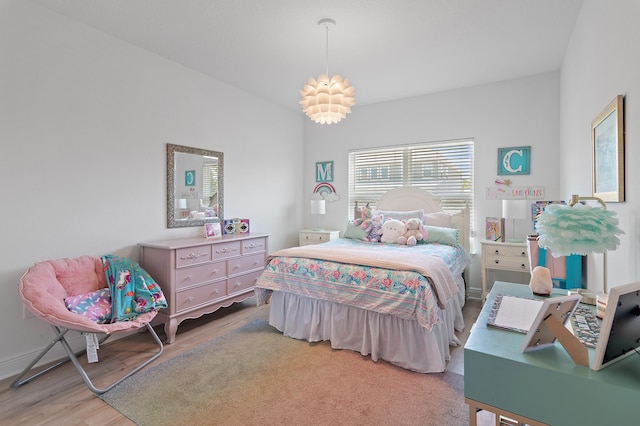 24 Palmer Ln, Santa Rosa Beach, FL 32459 - bedroom with baseboards and wood finished floors