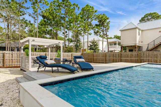 view of pool featuring a fenced backyard, a pergola, a patio area, and a fenced in pool