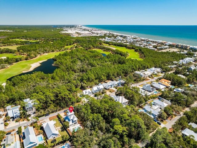 bird's eye view with a water view, golf course view, and a residential view